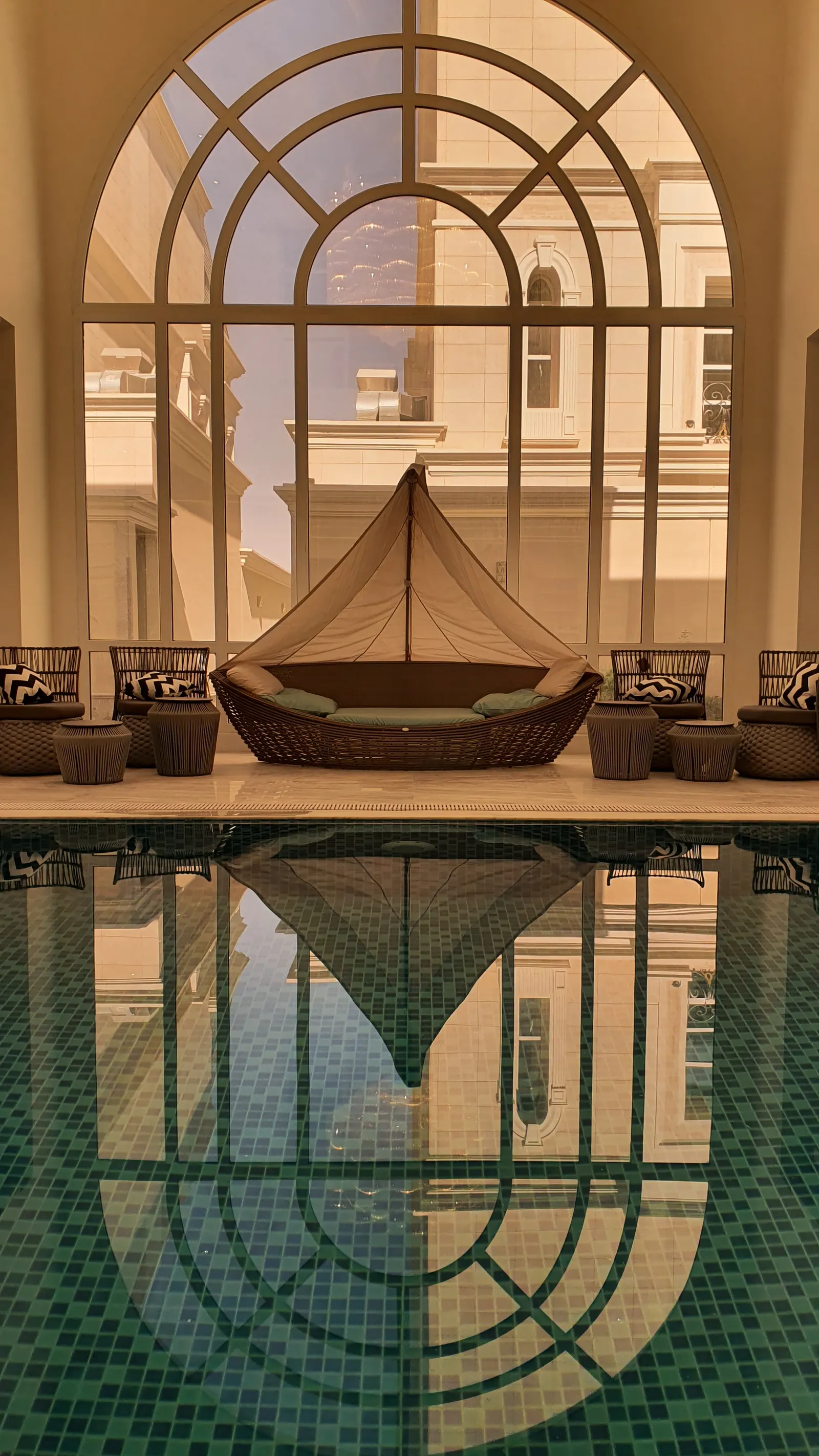 Pool hall with a sculptural boat seat