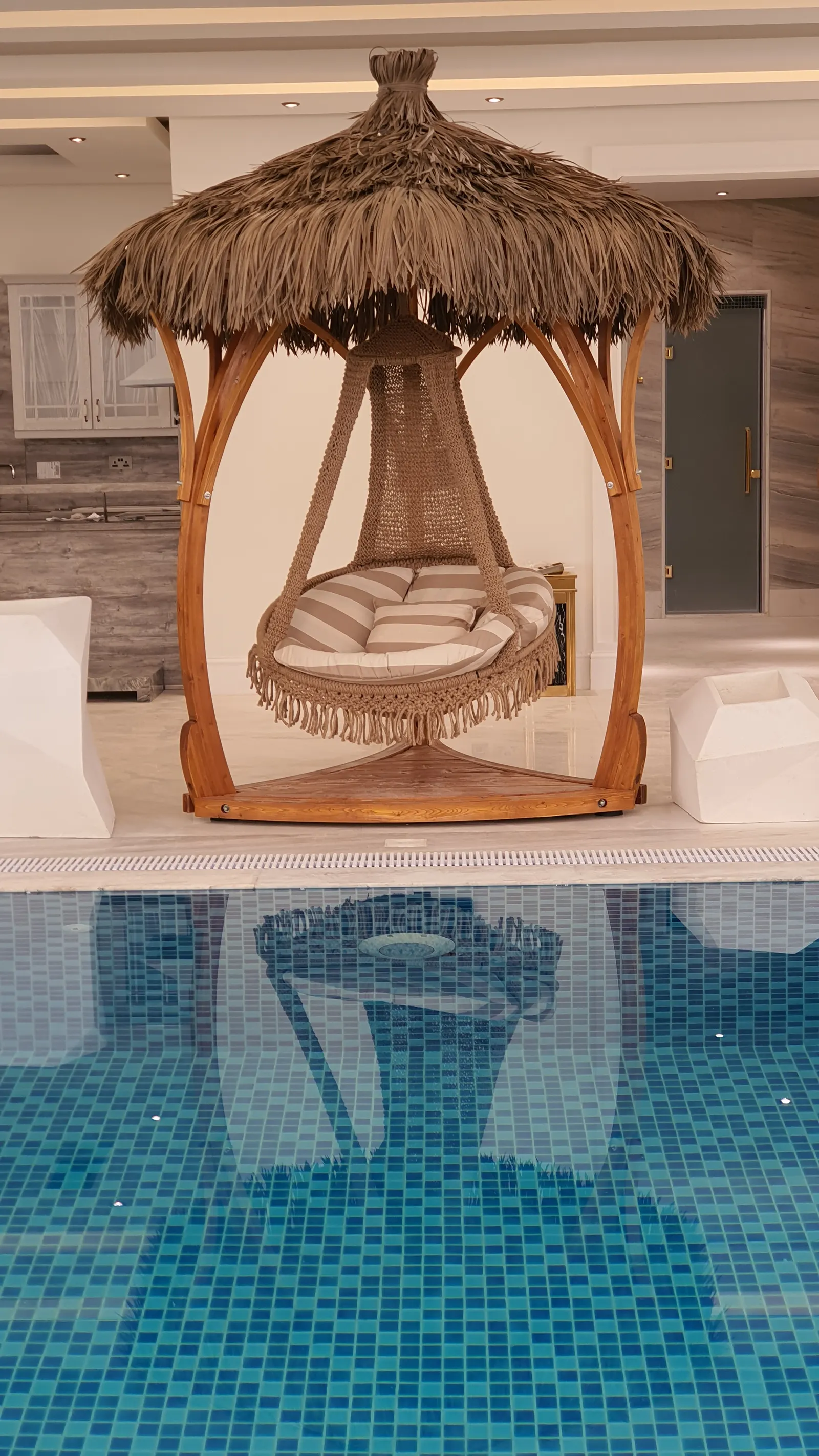 Cabana reflected in the pool